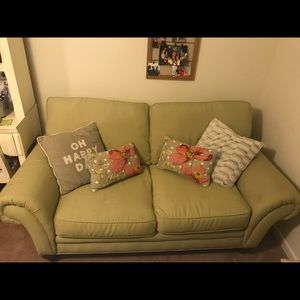 Light green loveseat
